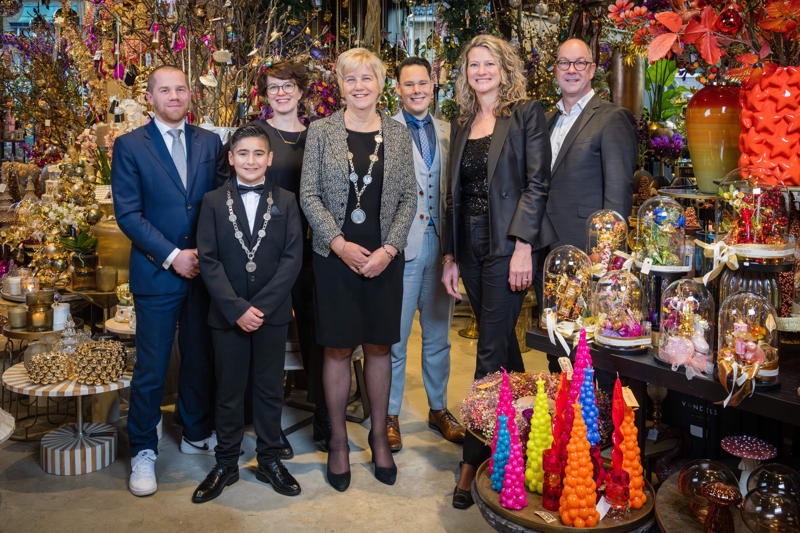 Kerstfoto van het college gemaakt door Daan van Oort bij Fiori di Rose in Oosterbeek